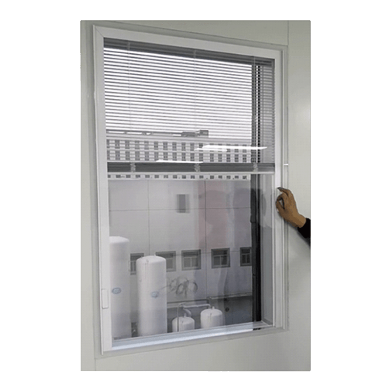 Window with manual magnetic built-in blind