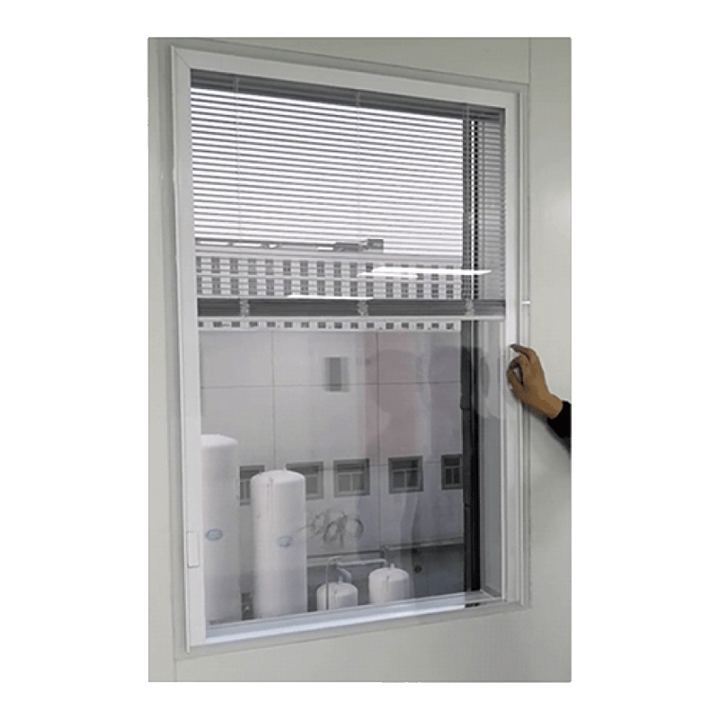 Window with manual magnetic built-in blind